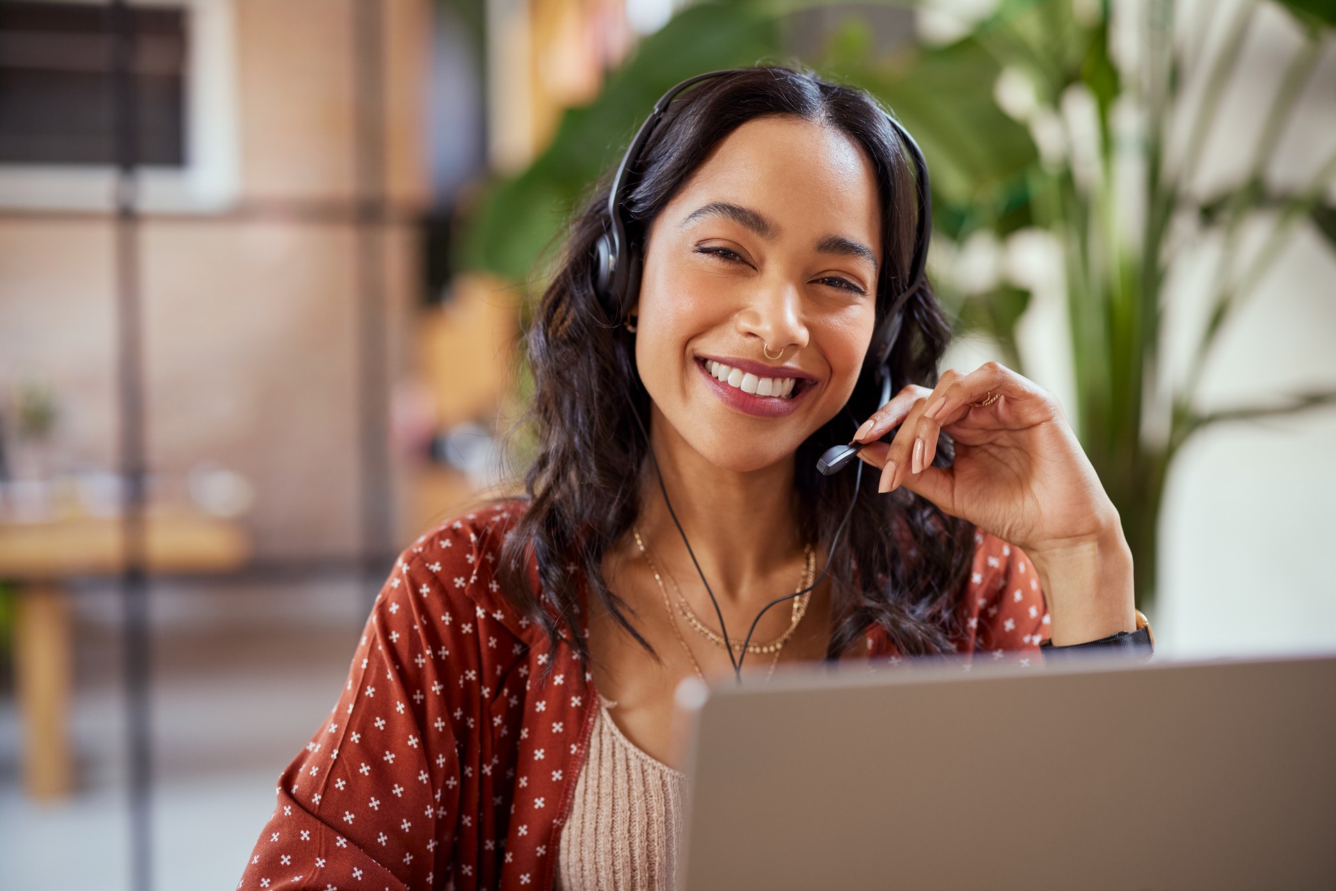 Portrait of smiling business woman with headset